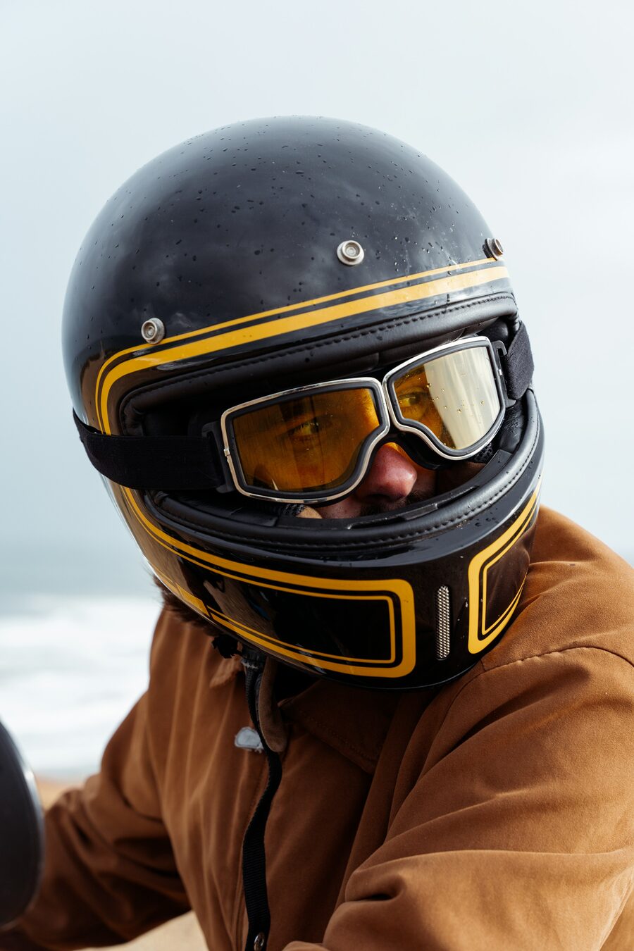 Powersports rider in a helmet and goggles
